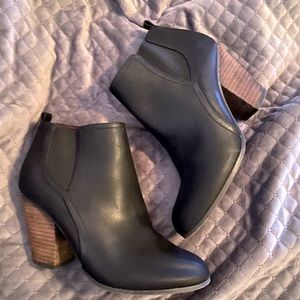 Black and brown ankle high booties